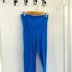 Neon blue Lulu yoga pants. Full length